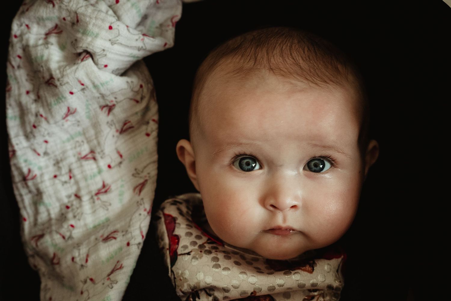 Baby girl looking at camera