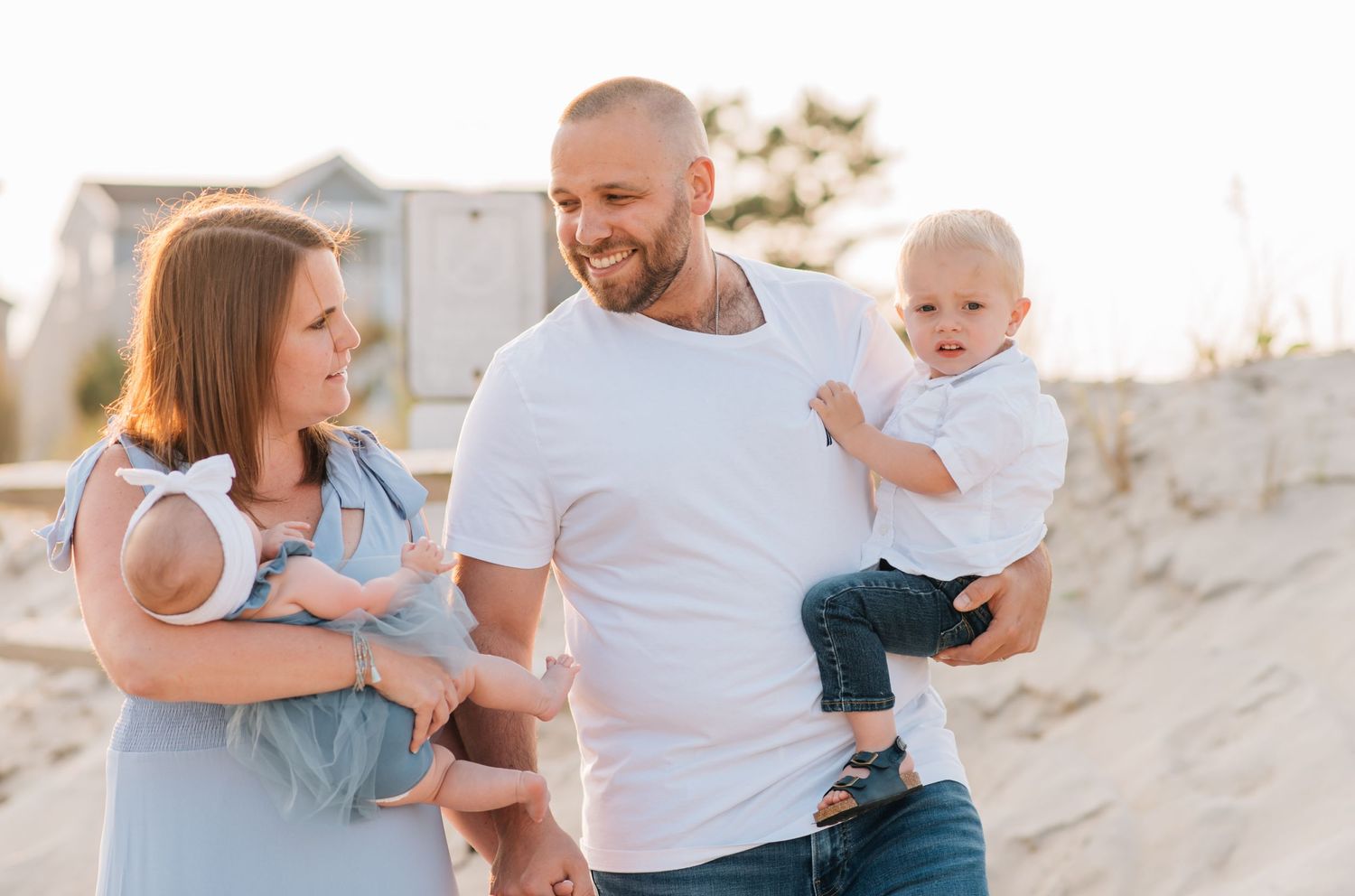 June photo session at the jersey shore of this beautiful family celebrating their daughter's 3 month birthday.