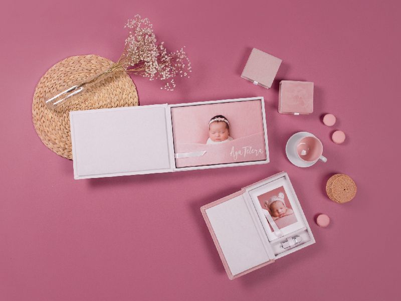 Pink-themed photo presentation with circular decorative elements and dried flowers.