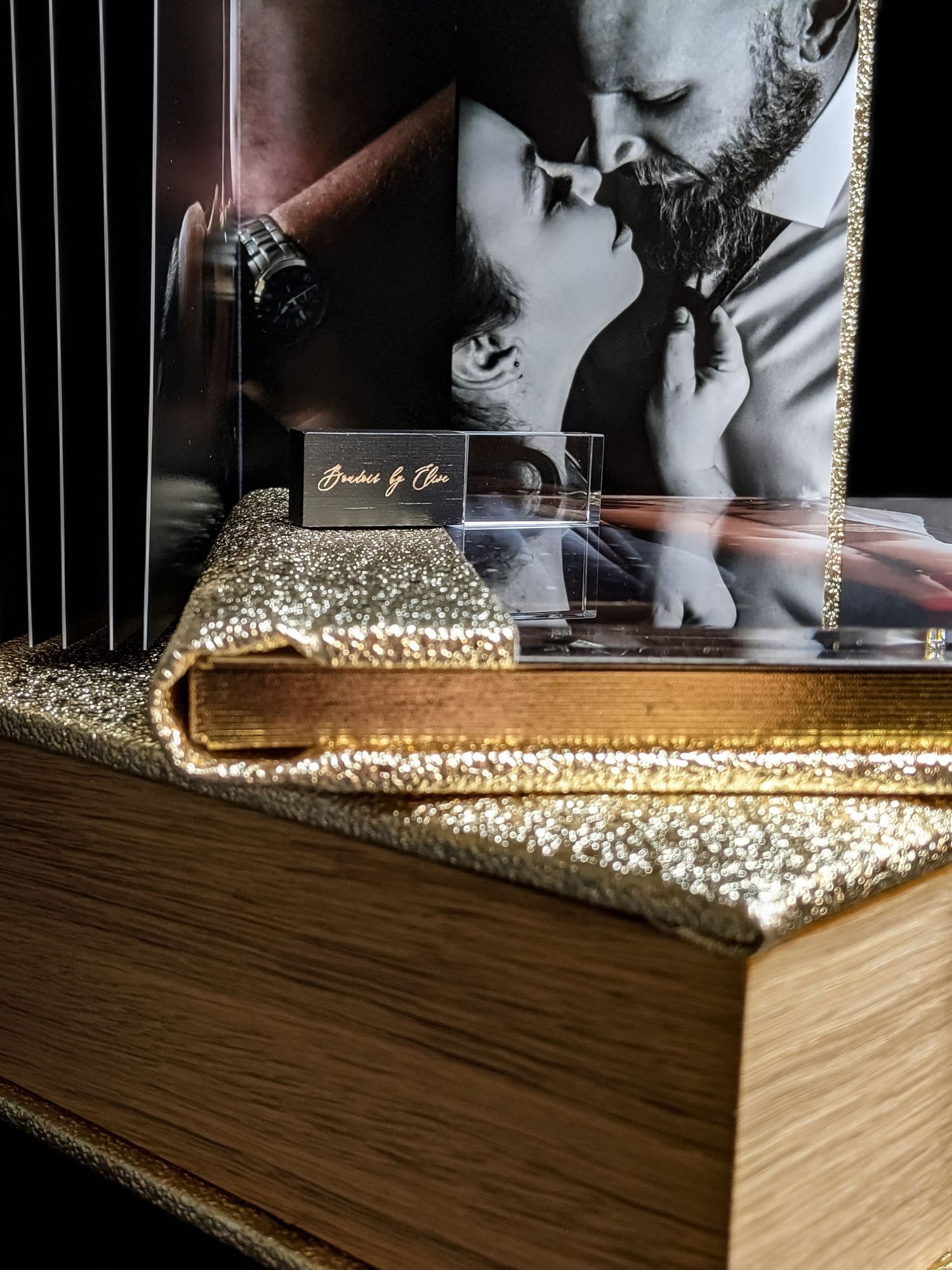 EXAMPLE OF THE LUXURY ALBUMS THAT BOUDOIR BY ELISE PROVIDES TO THEIR GORGEOUS CLIENTS, SHOWING THE GOLD GILDING