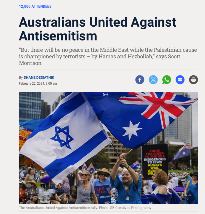 Rally participants wave Israeli and Australian flags at an anti-antisemitism demonstration.