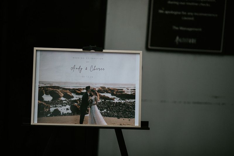 Elegant table settings and decor at an indoor wedding reception venue.