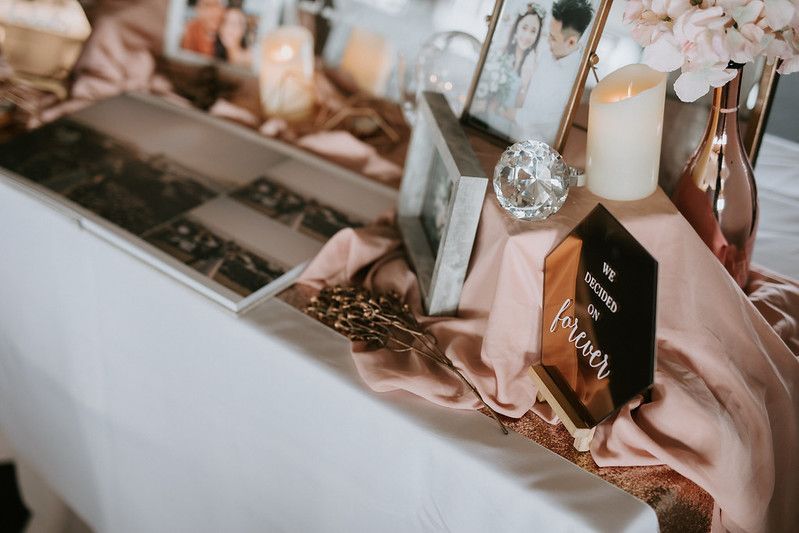 Wedding reception details with candlelight and romantic decor elements.