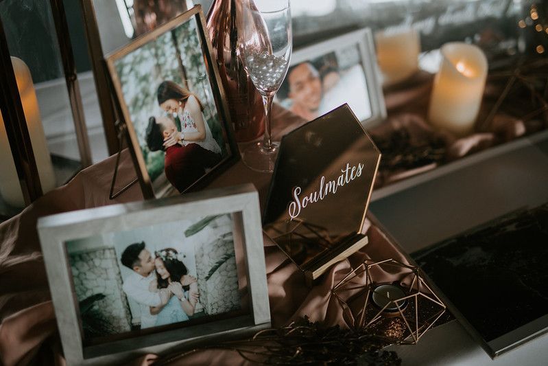 Wedding reception table decorations with vintage-inspired styling elements.