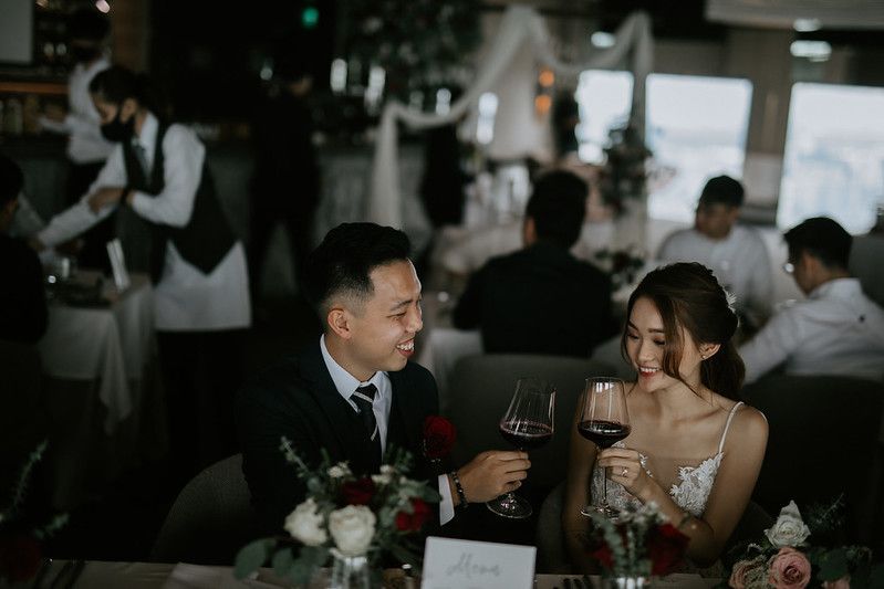 Wedding reception dinner scene with guests enjoying the celebration.