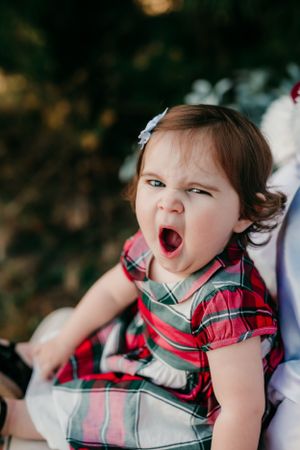Expressive moment captured during Christmas photo session.