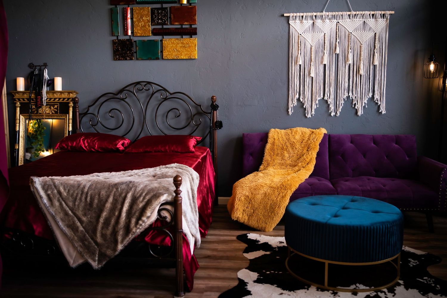 red satin sheets with a purple couch