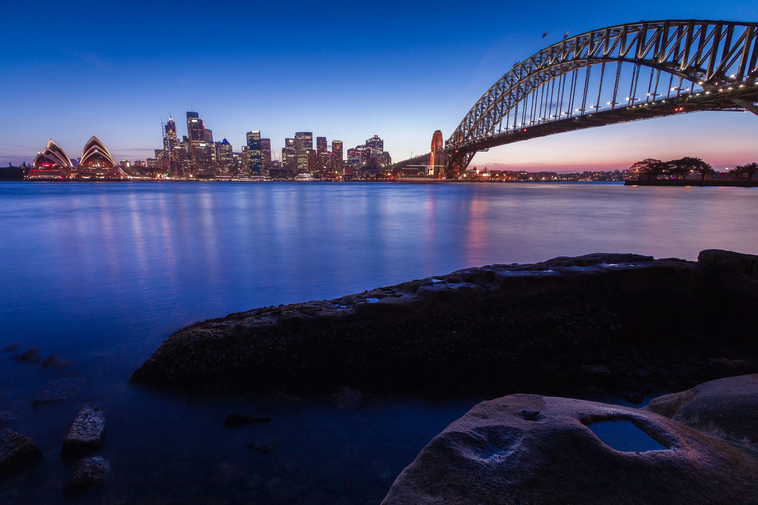 Sydney Opera house view from Mary Booth Lookout Reserve during sunset.