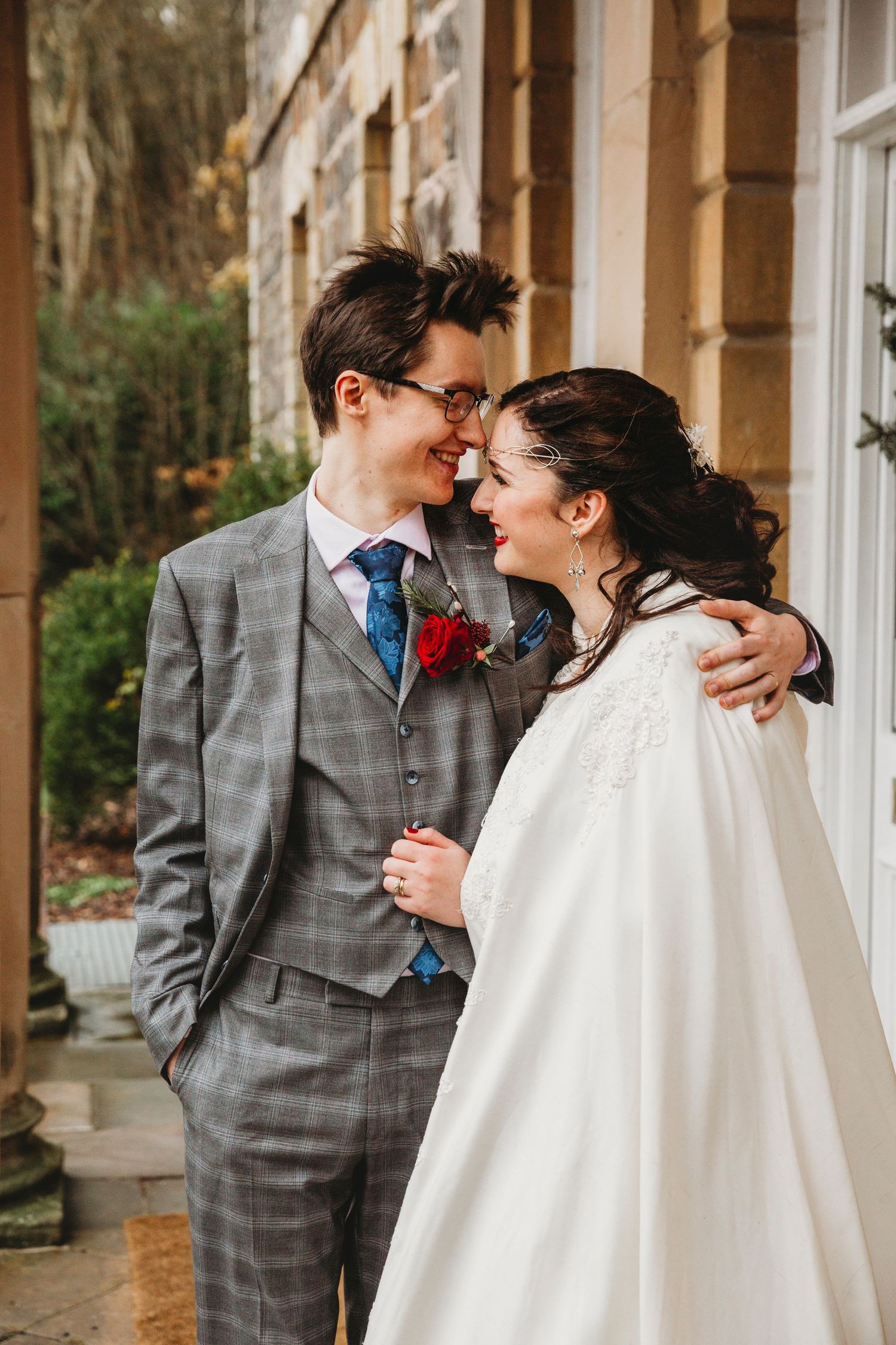 A series of romantic wedding photos showing a couple in a grey suit and white dress against a classic building exterior.