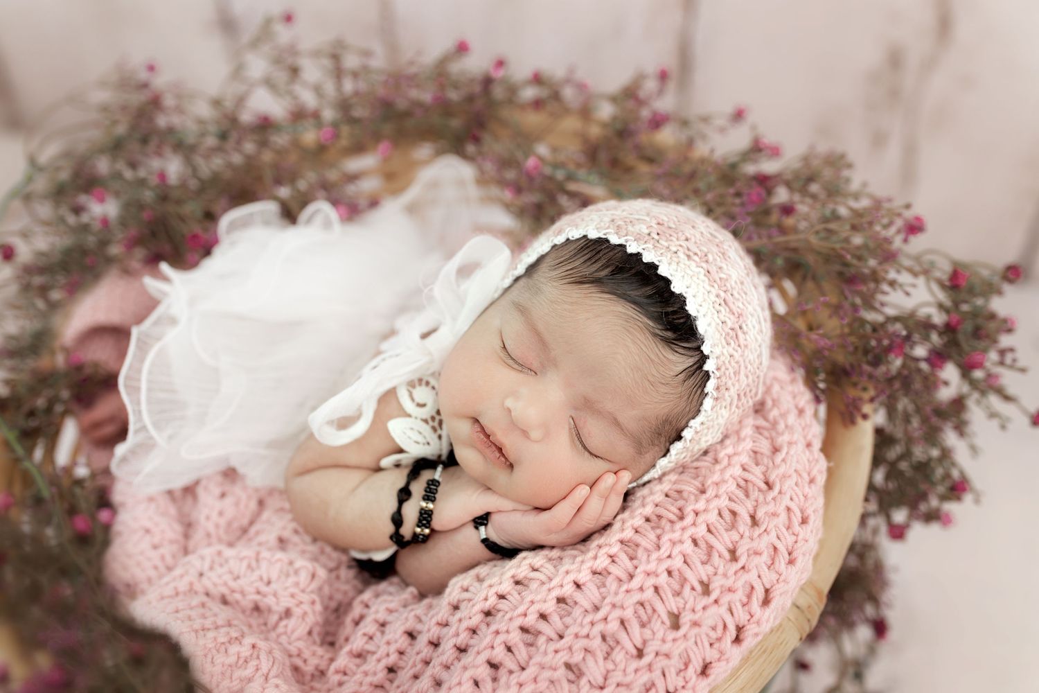 Newborn family baby photographer east cork west Waterford baby on a bed in flowers