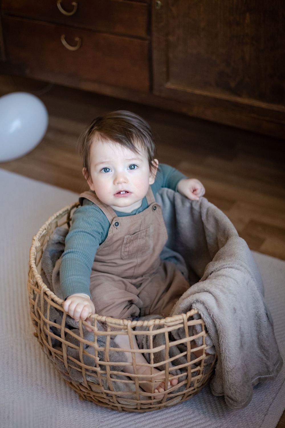 baby photoshoot in basket