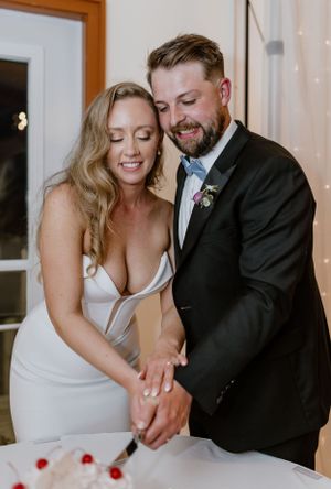 Cake cutting at wedding reception at Saraguay House in Halifax, Nova Scotia