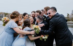 Wedding party photos in front of Dingle Tower at Sir Sandford Fleming Park, Halifax Nova Scotia