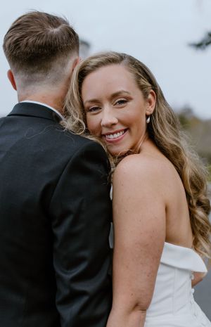 Bride and groom photos in front of Dingle Tower at Sir Sandford Fleming Park, Halifax Nova Scotia