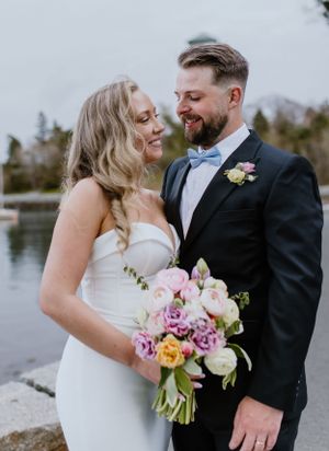 Bride and groom photos in front of Dingle Tower at Sir Sandford Fleming Park, Halifax Nova Scotia