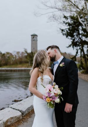 Bride and groom photos in front of Dingle Tower at Sir Sandford Fleming Park, Halifax Nova Scotia