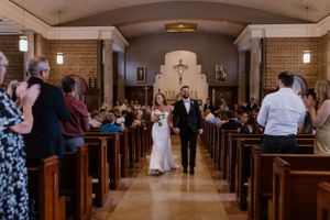Bride and groom walking down the aisle as husband and wife in church ceremony in  Halifax, Nova Scotia