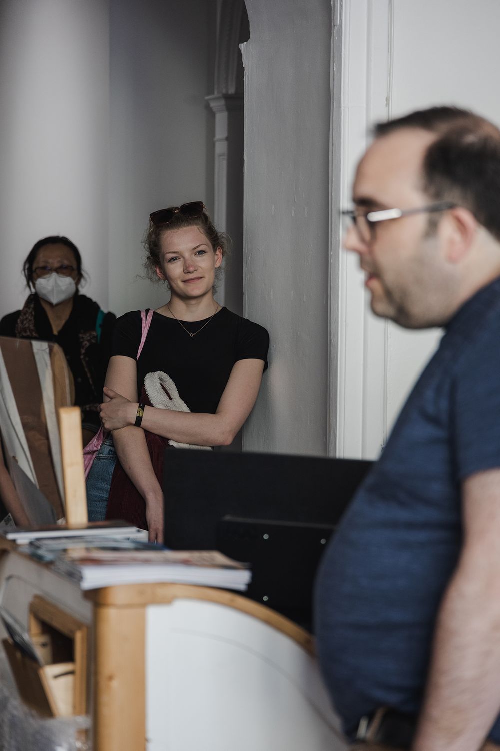 photo of a Galway international arts festival volunteers meeting with an artist at the arts centre in Galway