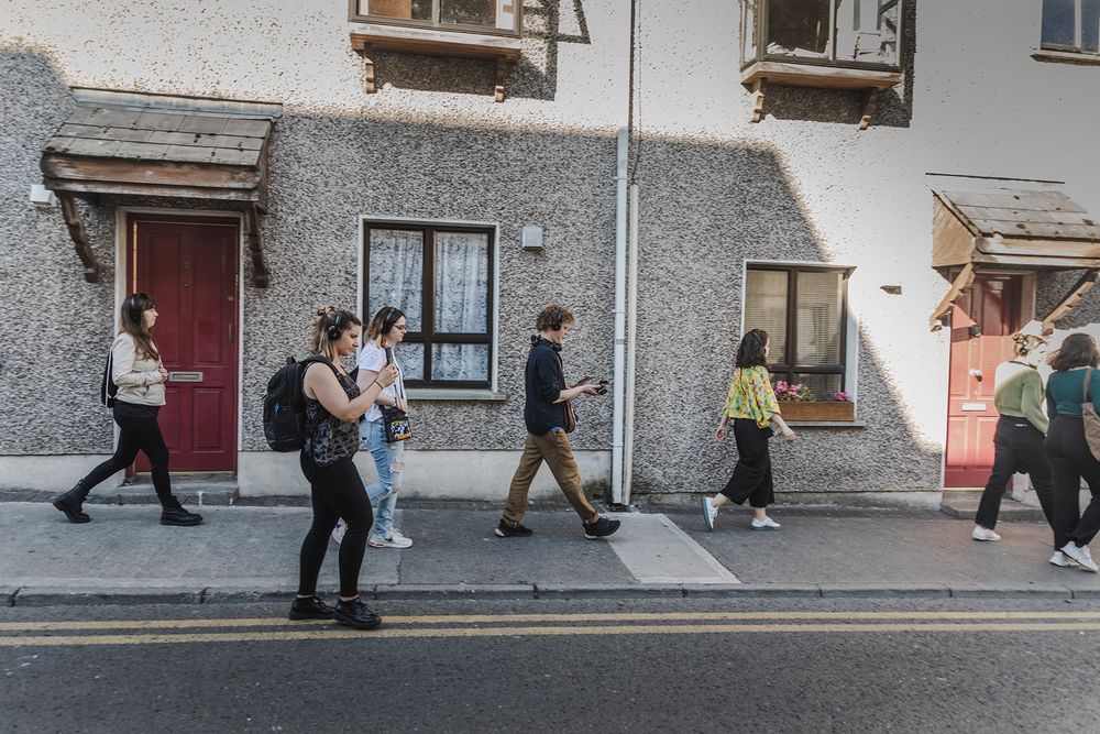 photo of a Galway international arts festival volunteers enjoying Silent disco in Galway streets