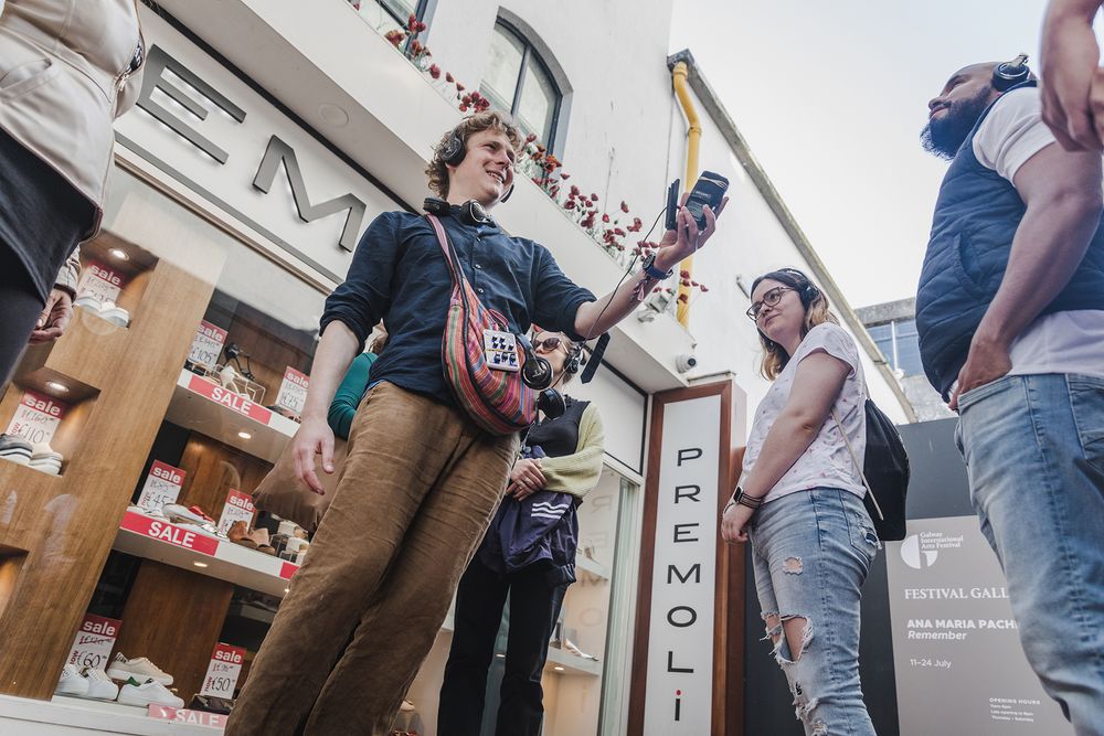 photo of a Galway international arts festival volunteers enjoying Silent disco in Galway streets