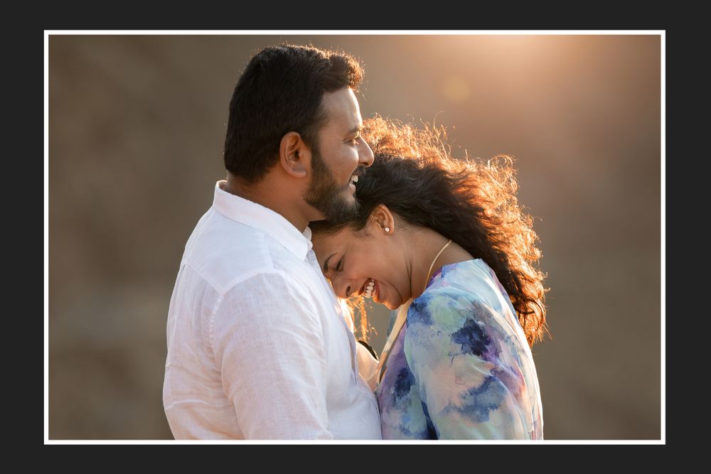 An intimate moment captured during golden hour with soft natural lighting.