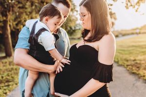 little boy touching belly