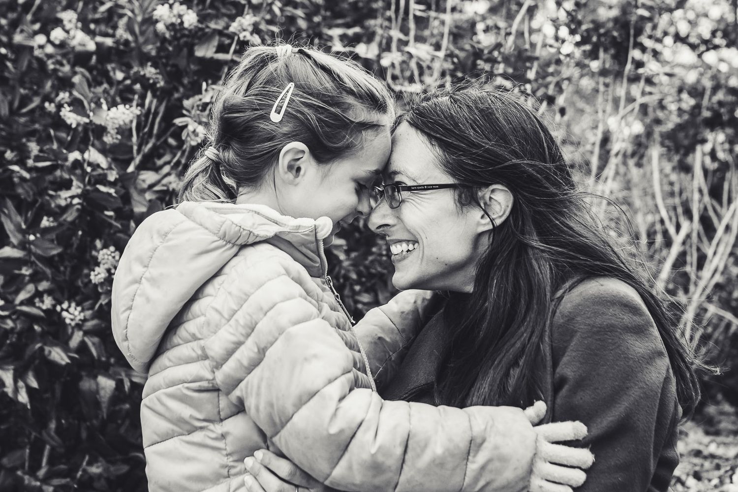 Mother daughter cuddling in Seattle