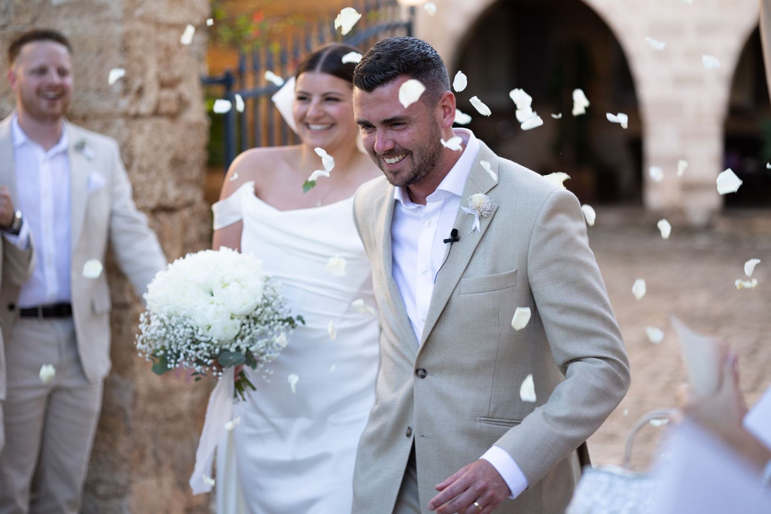 Bride and groom with confetti