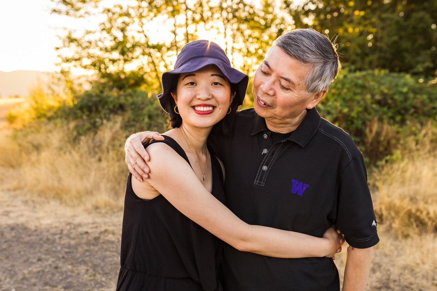 Father looks lovingly at daughter at Issaquah Highlands by Redmond Family Photographer