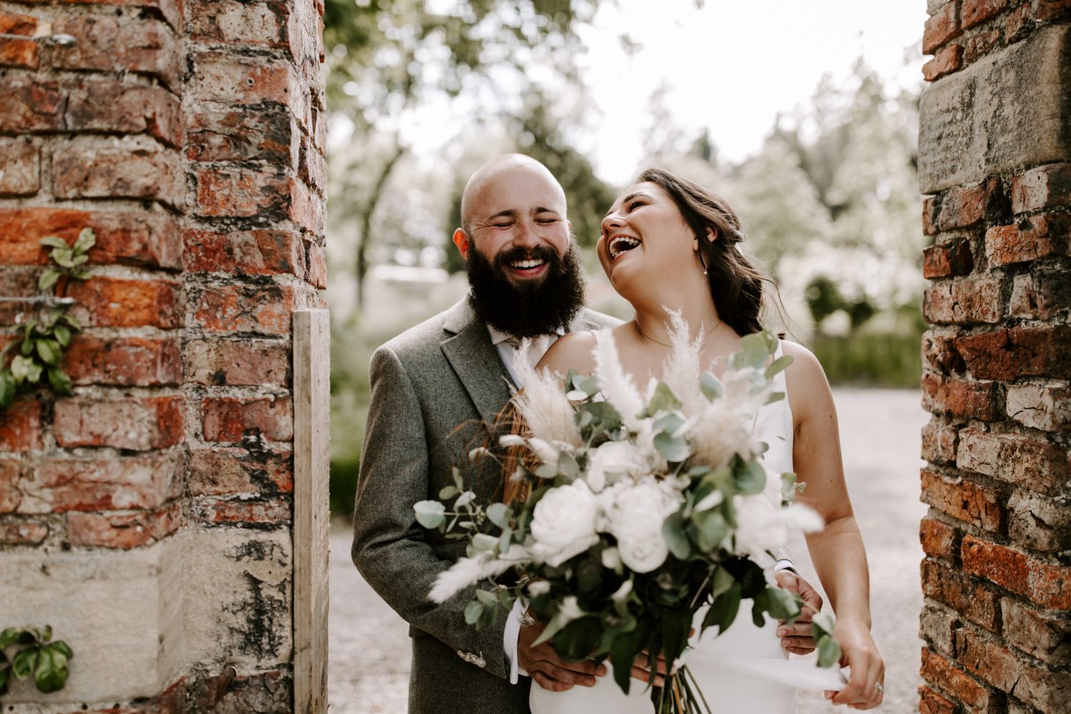 Wedding couple laughing