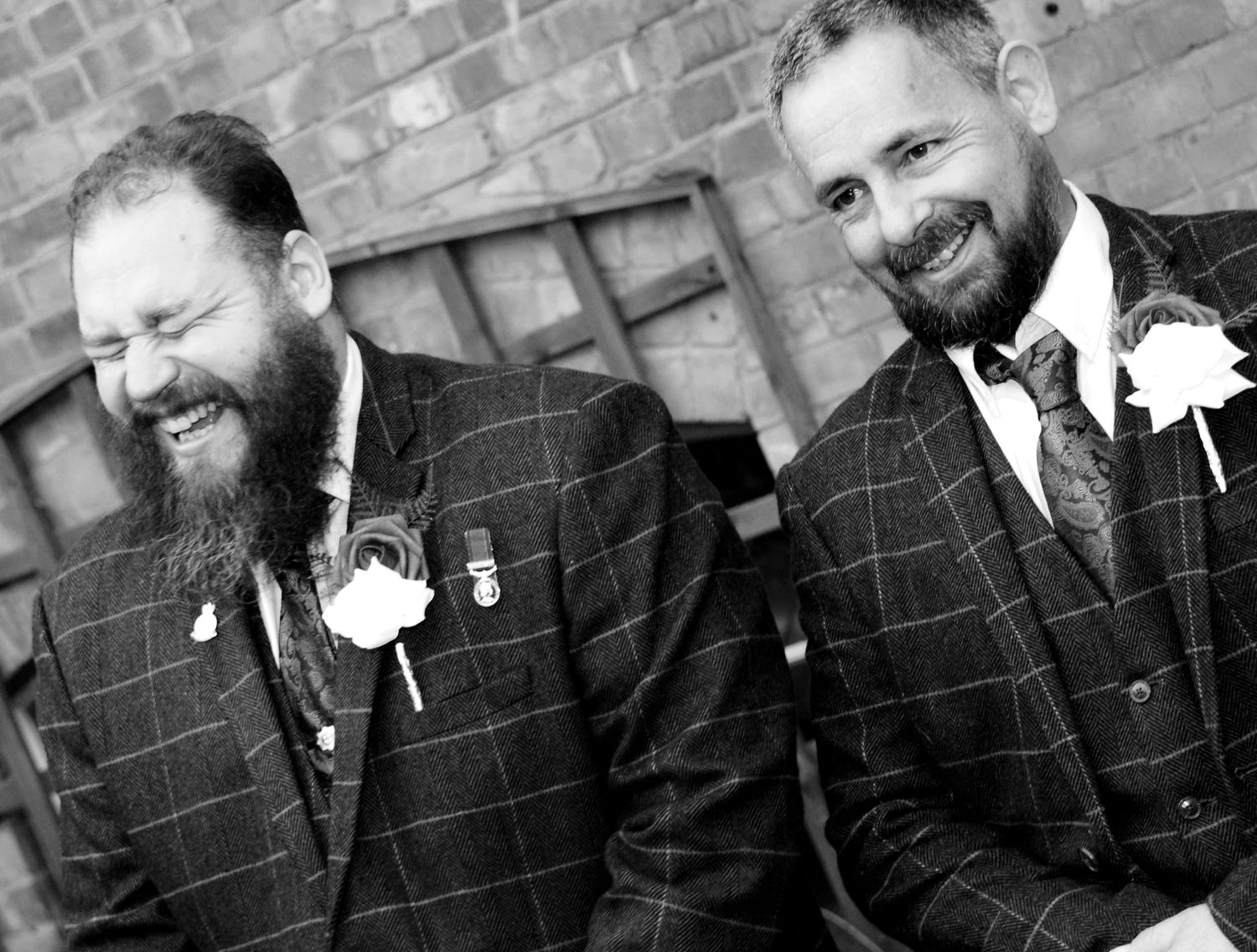 Best man making the Groom laugh at his Warwickshire Wedding