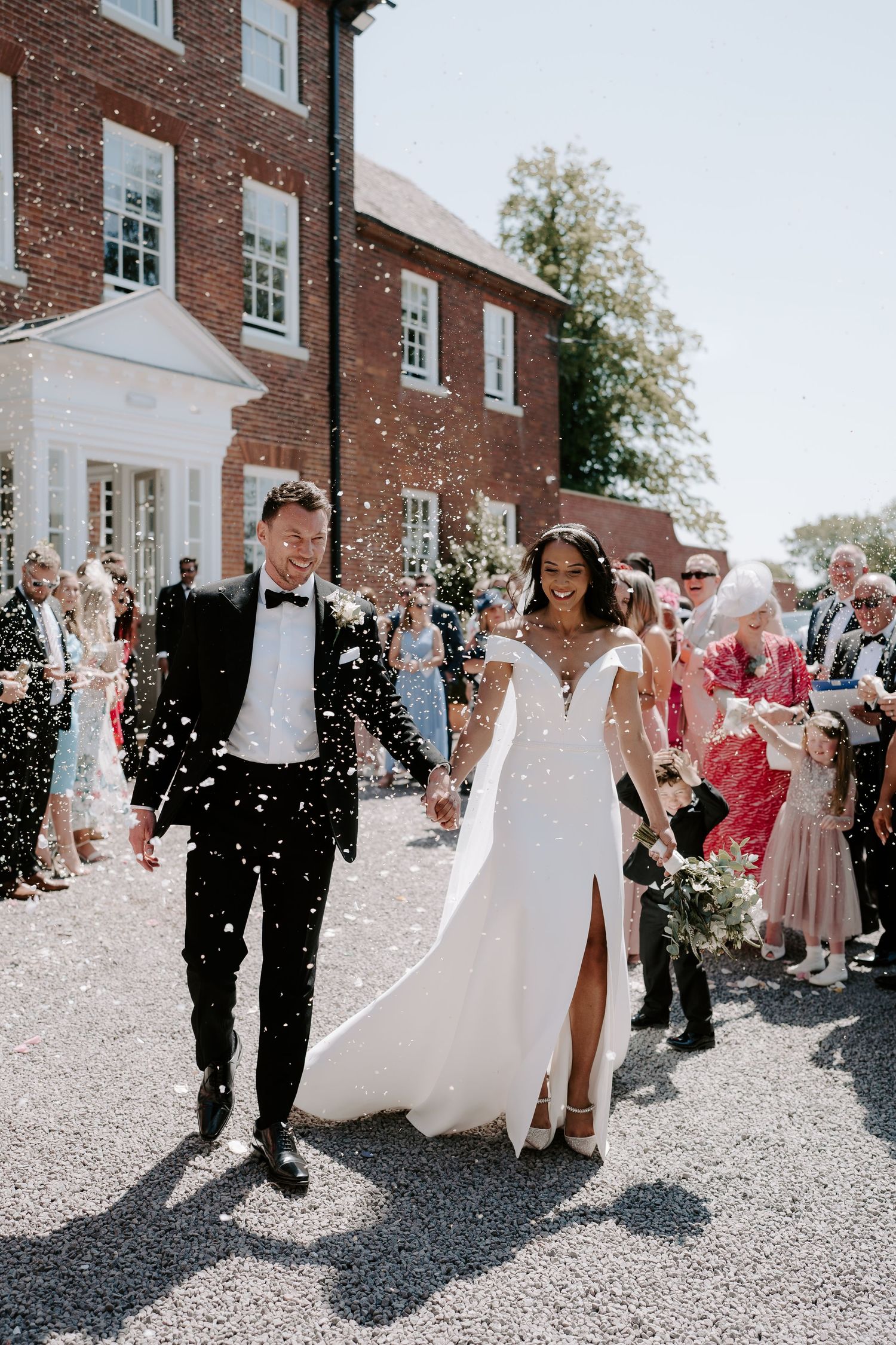 bride-and-groom-confetti-stockton-house-wedding-shropshire