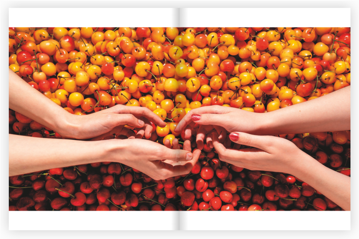 Poppn Magazine pages of published photography work, layout of cherries and two pair of hands above cherries.