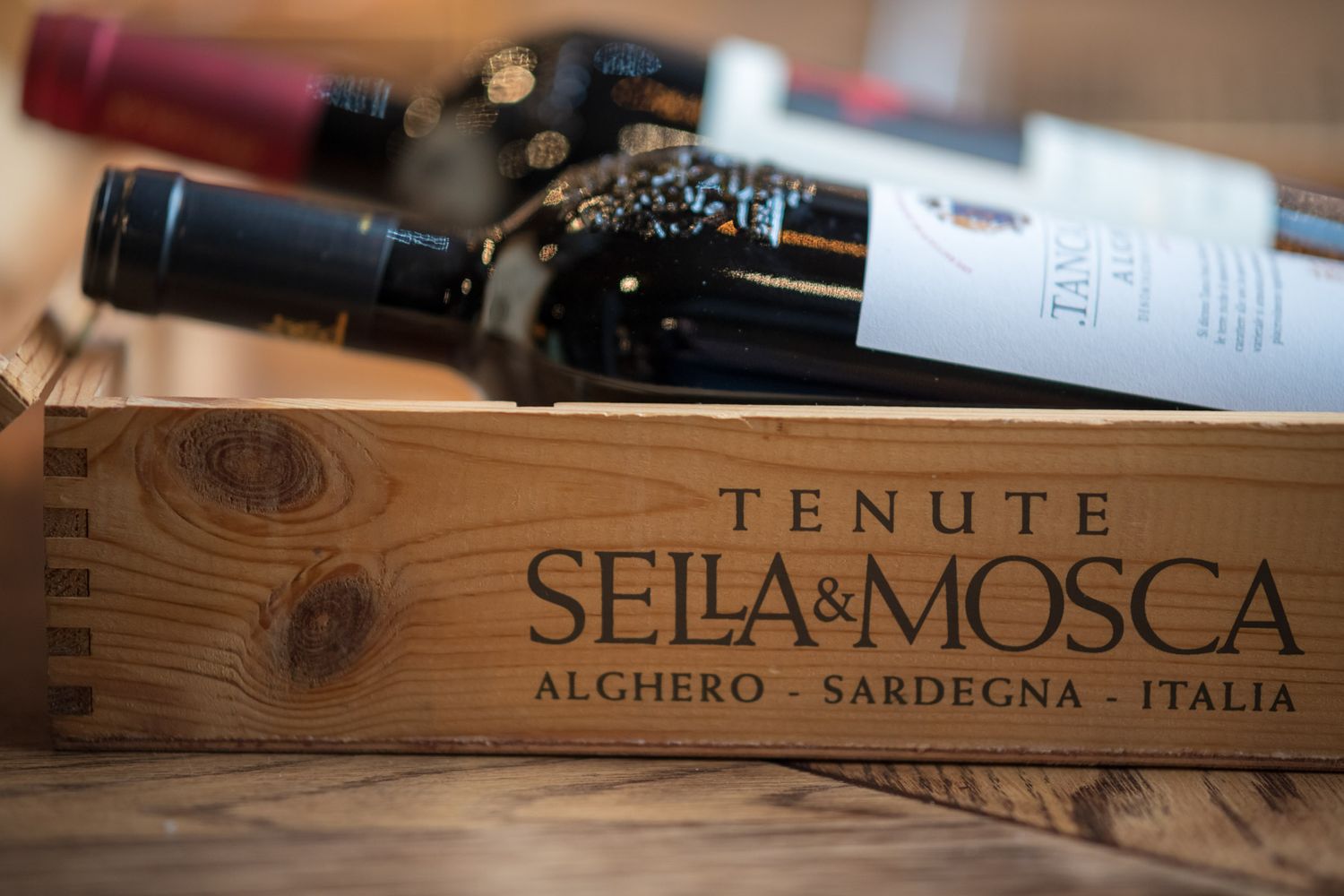 Wooden wine crates from Sella & Mosca winery in Sardinia, Italy.