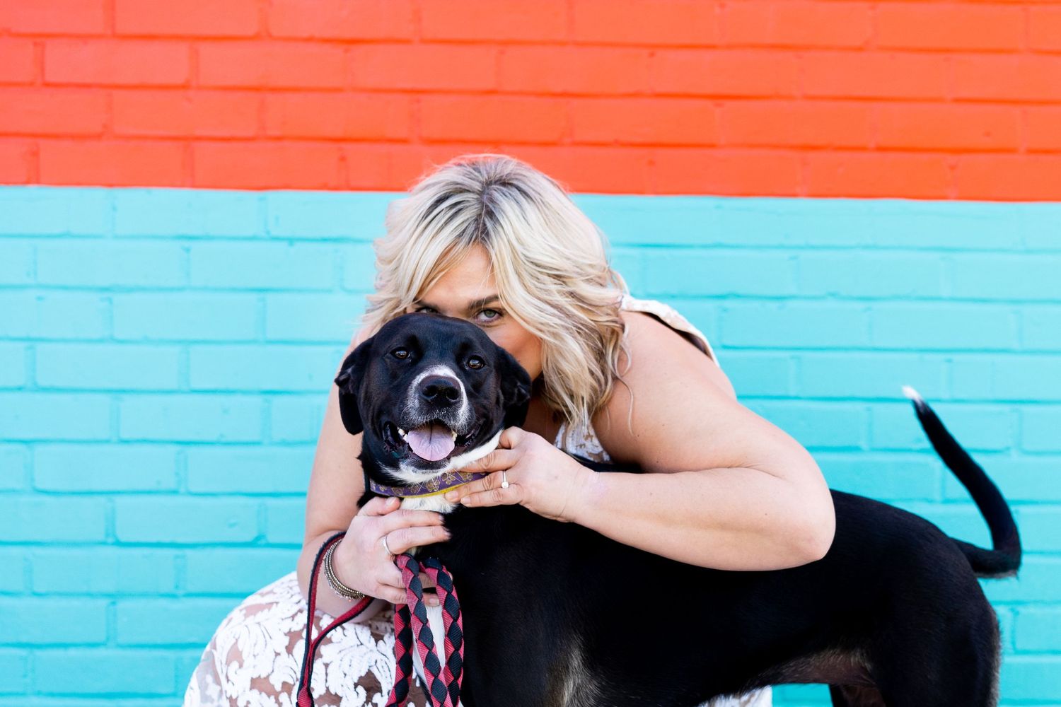 A woman kisses her dogs head in Mid-City Baton Rouge.