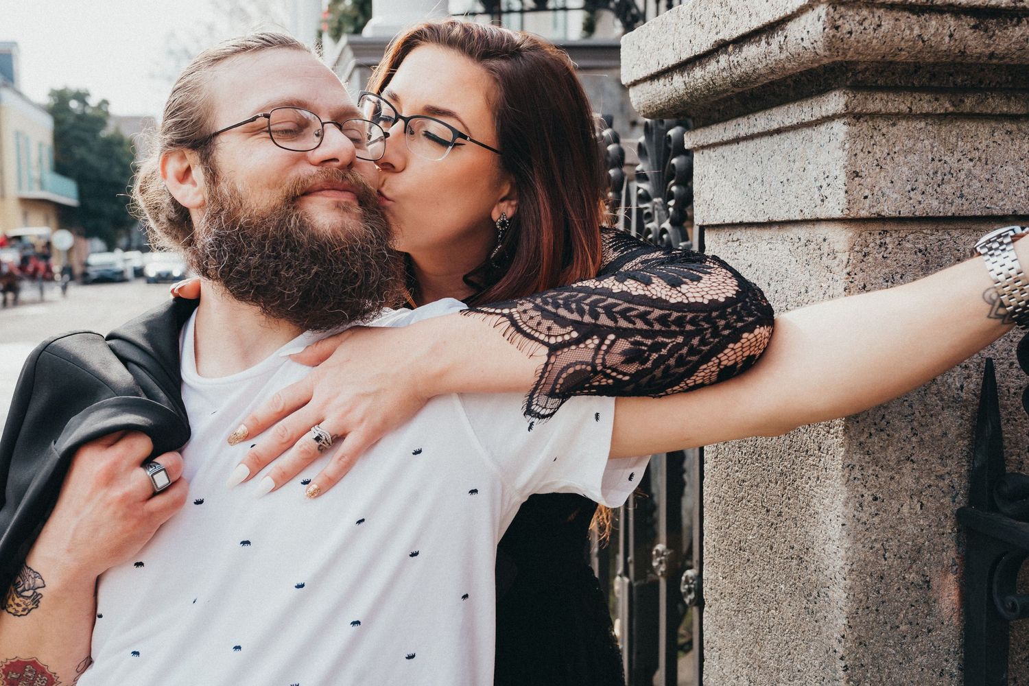 A couple share a kiss outside of the Beauregard Keyes House in New Orleans.