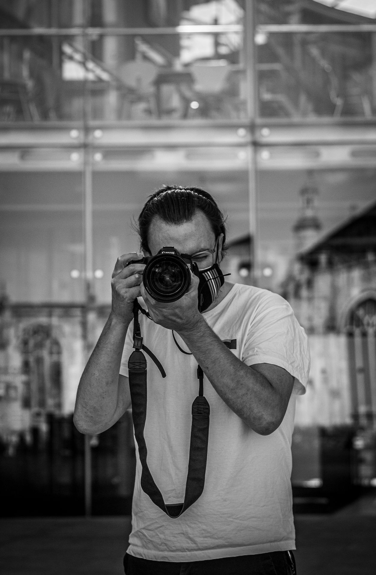 Picture of. man holding a camera