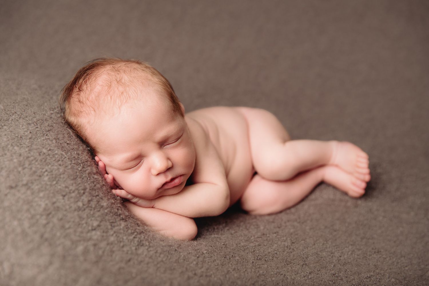 baby boy on grey blanket taken by sarah savage, kansas city newborn photographer