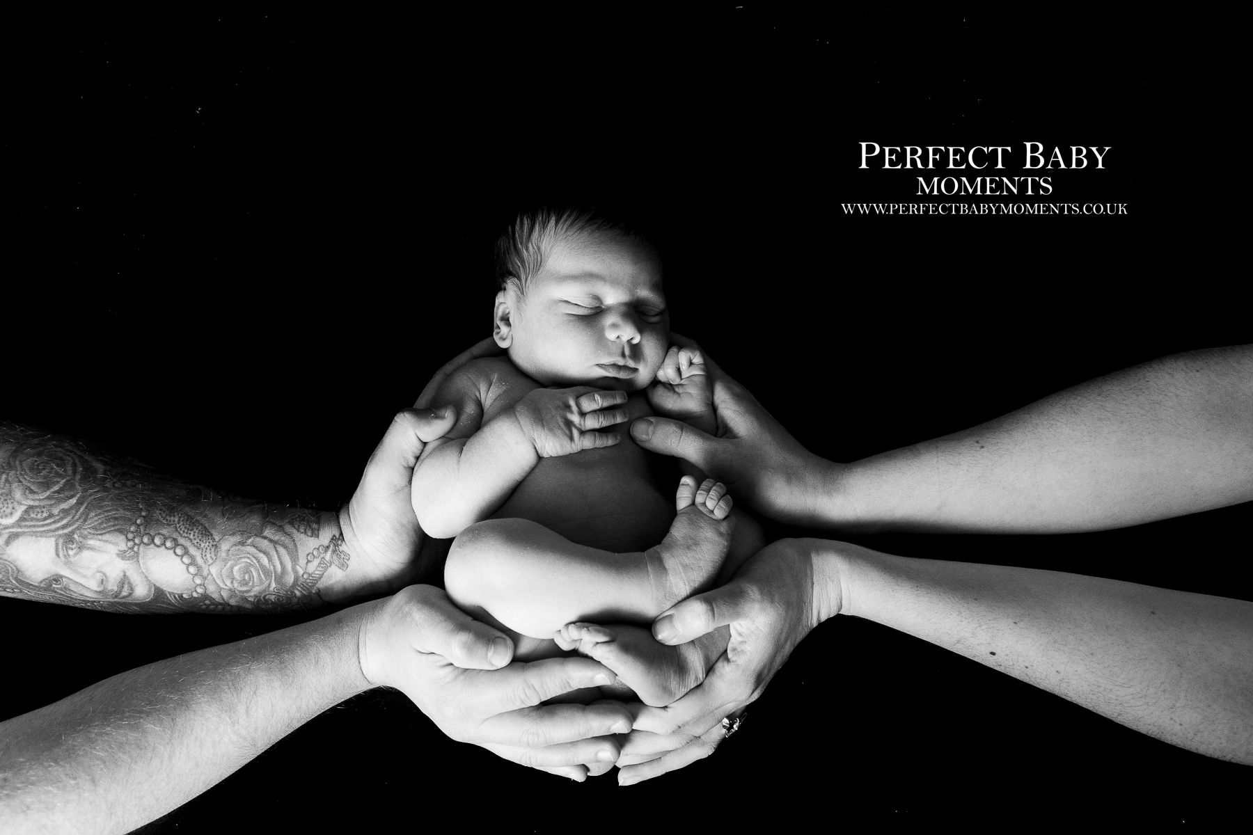 4 hands are better than Two in this newborn photo