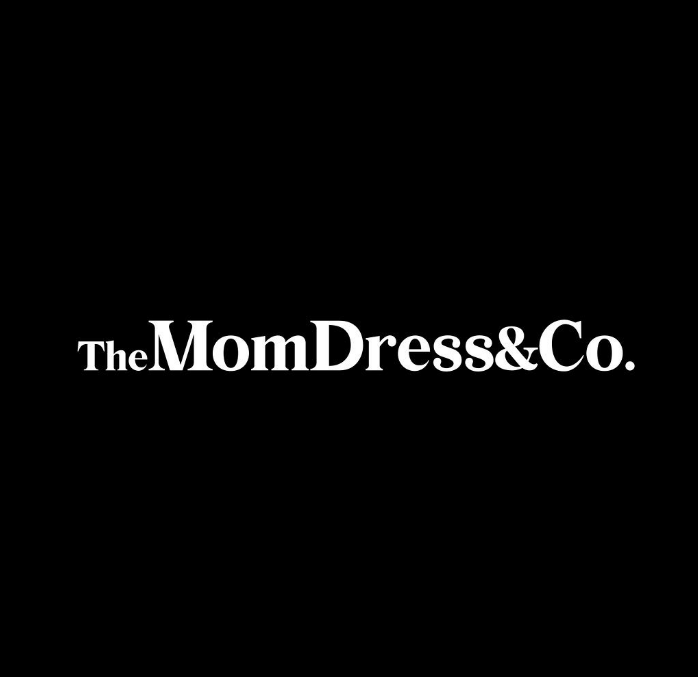 Black and white typography logo for The Mom Dress & Co.