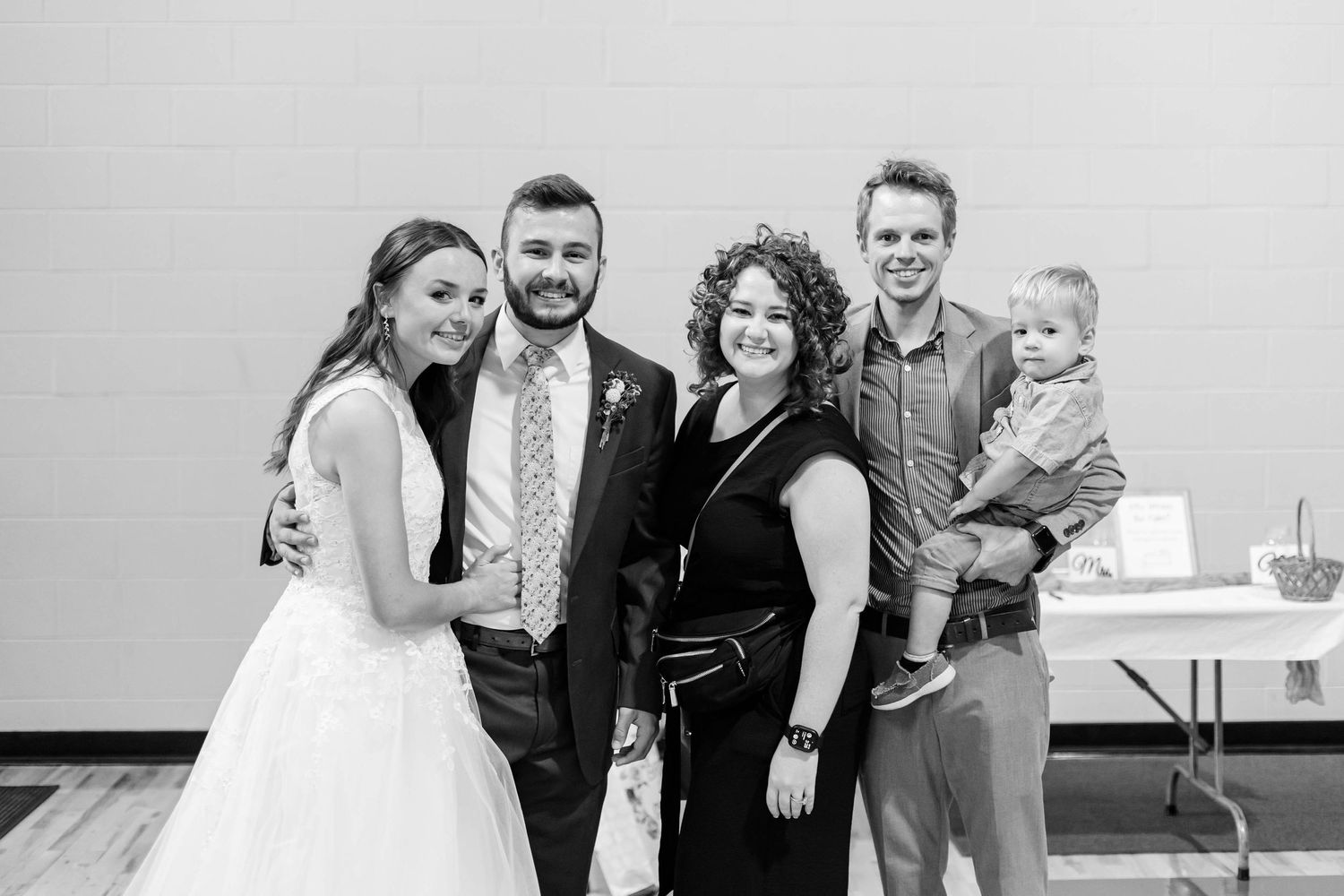 bride and groom with photographer