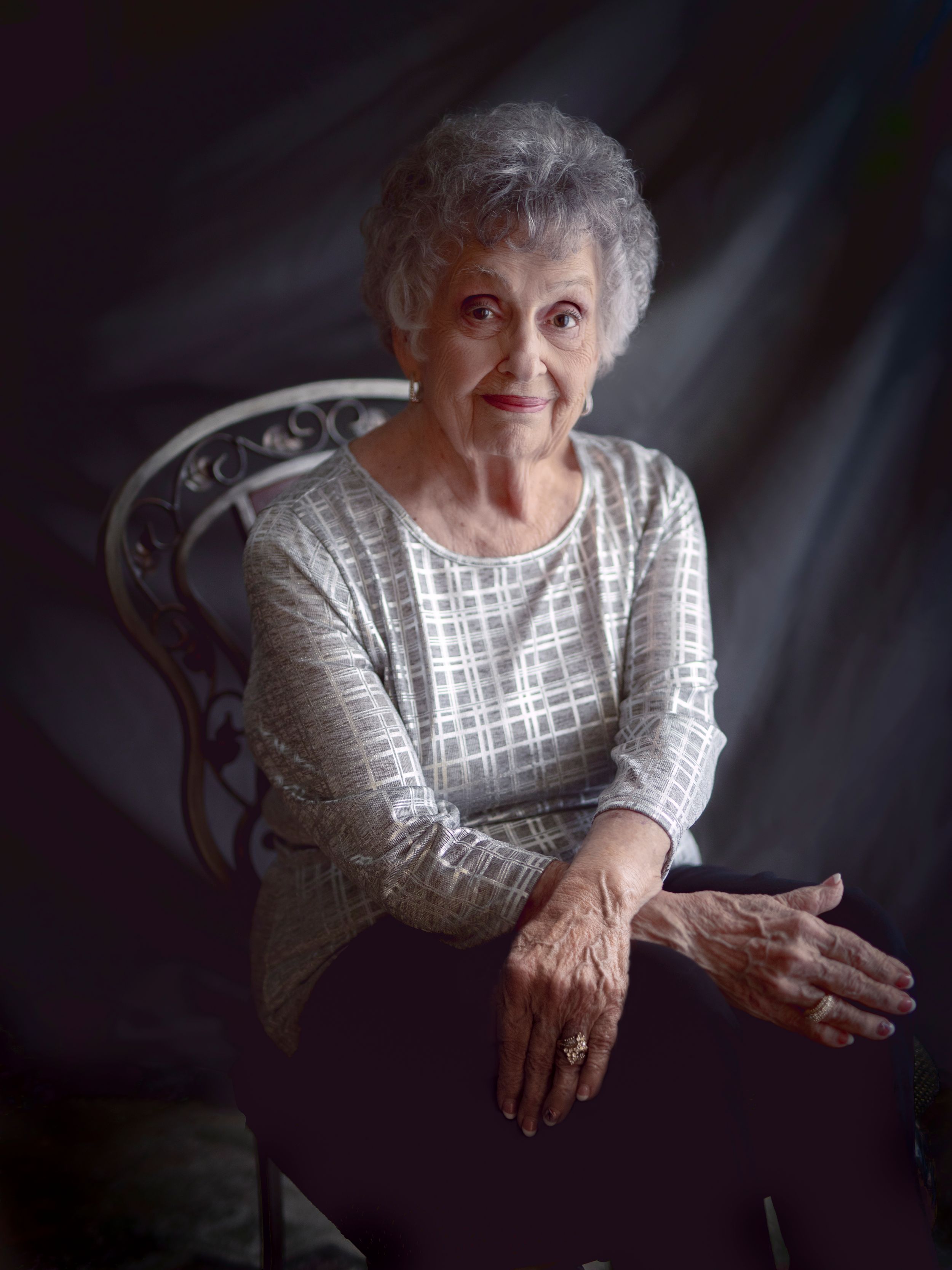 Elegant Portrait of Mature Woman in Studio