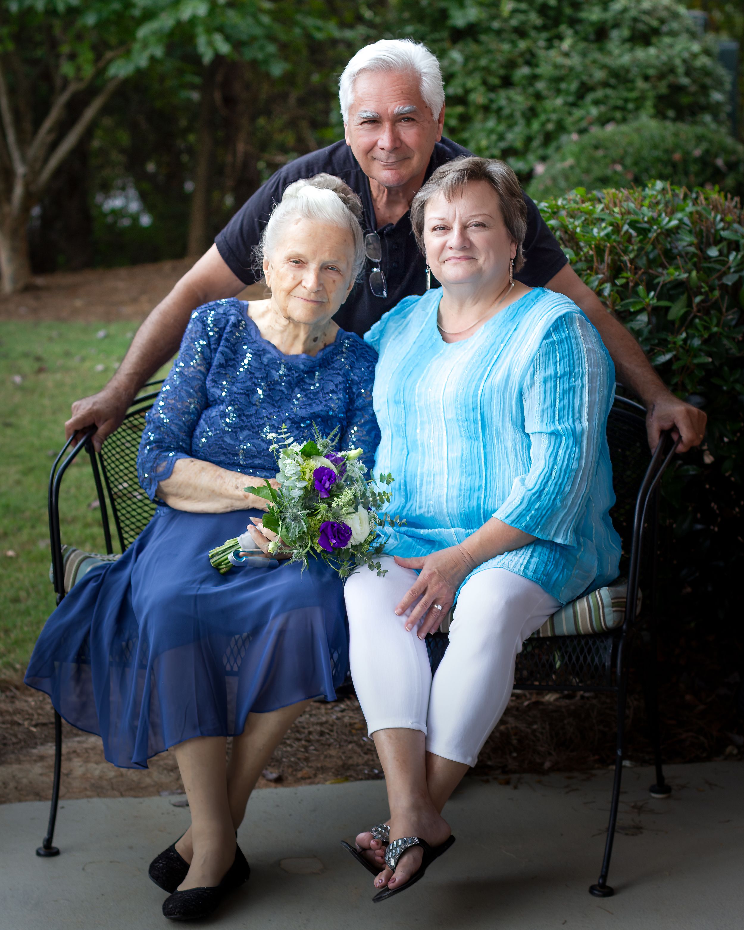 Family Portrait of Elderly Mother with Daughter and Son-in-Law