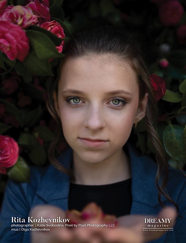 Dreamy Magazine page of published photography work, female portrait in the bush of roses.
