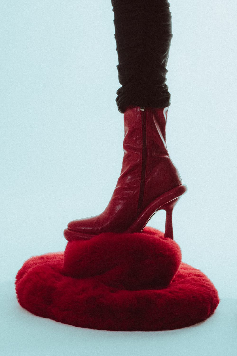 Bold in Red: Fashion Forward Statement with High Heel Boot and Luxurious Fur, a Miami Fashion Photographer's Perspective
