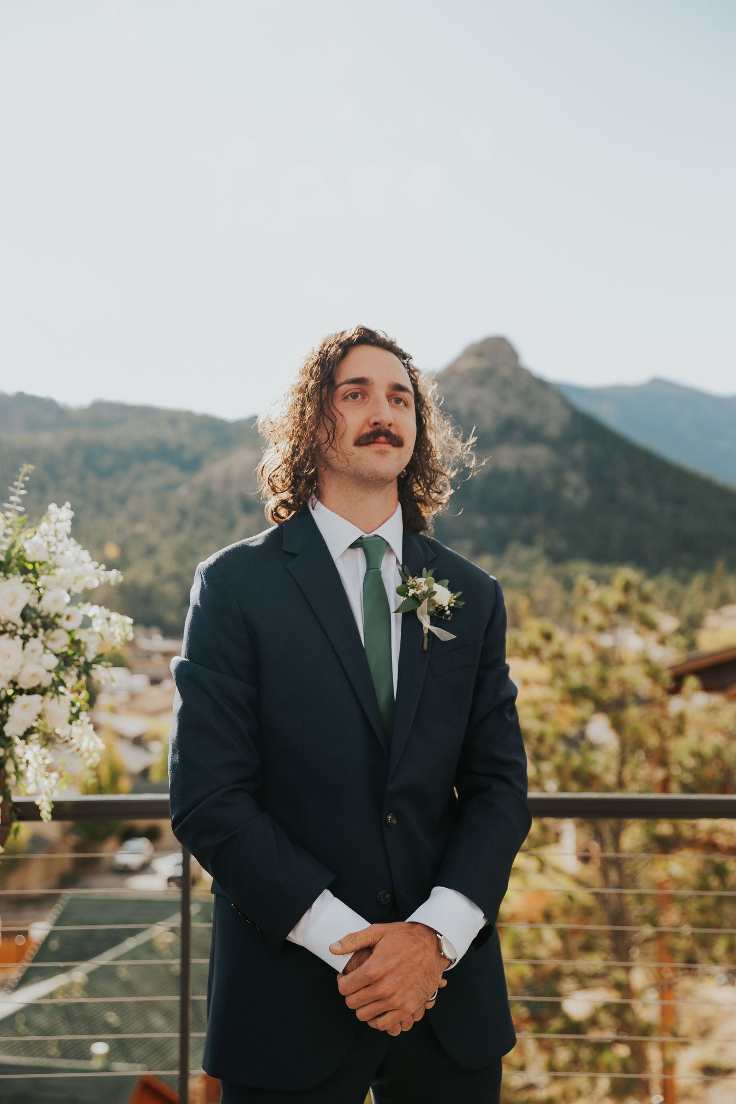 Grooms reaction to bride coming down the aisle