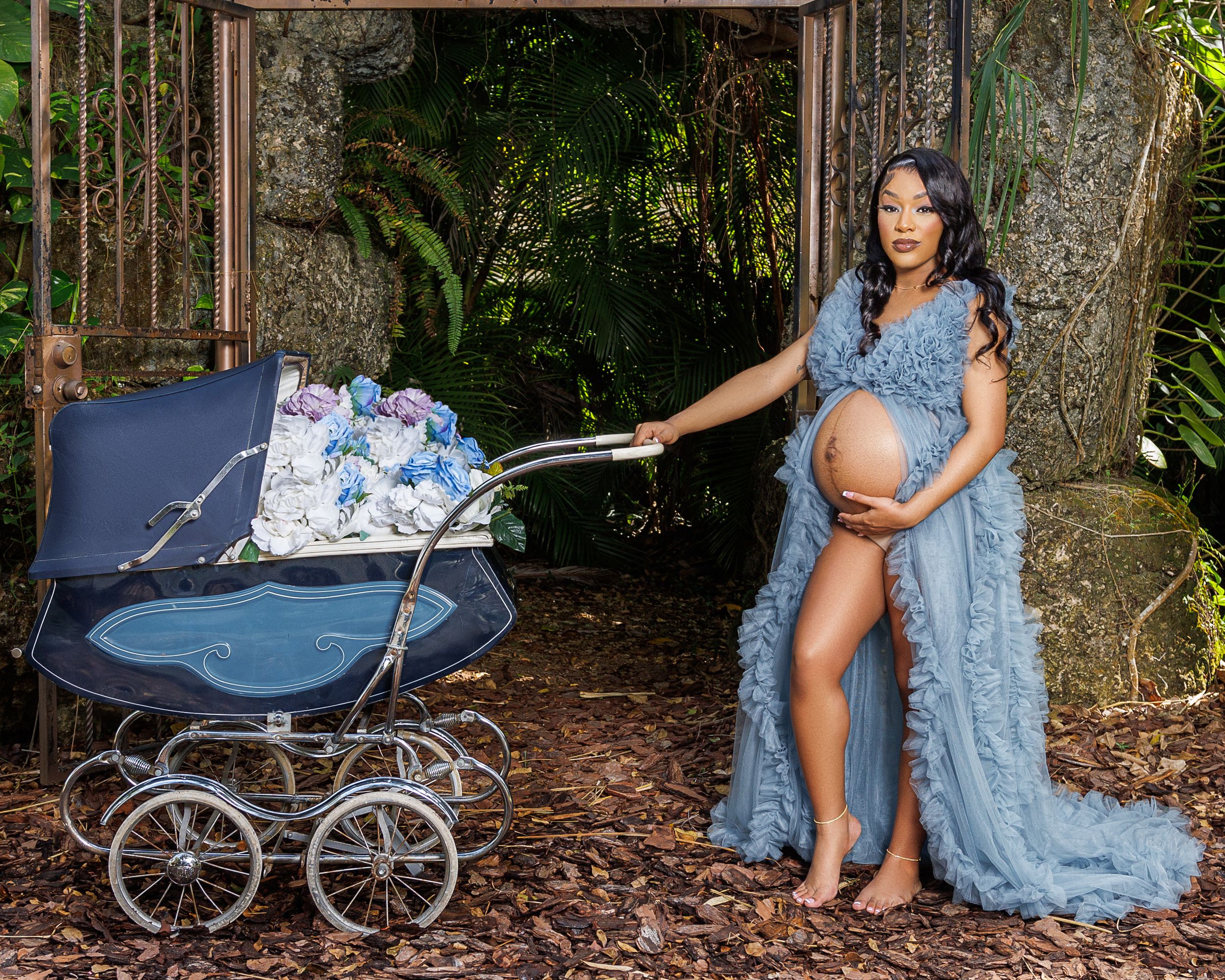 Stunning maternity photoshoot with baby carriaggge