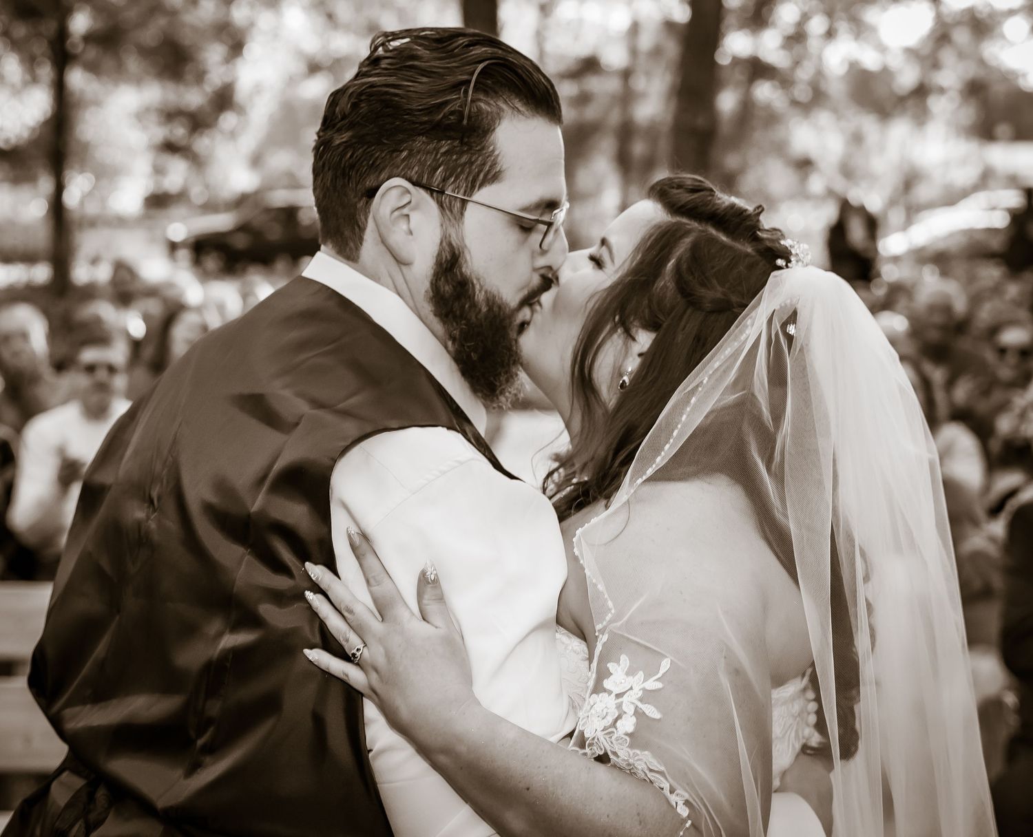 Black and white wedding photography series capturing intimate romantic moments.