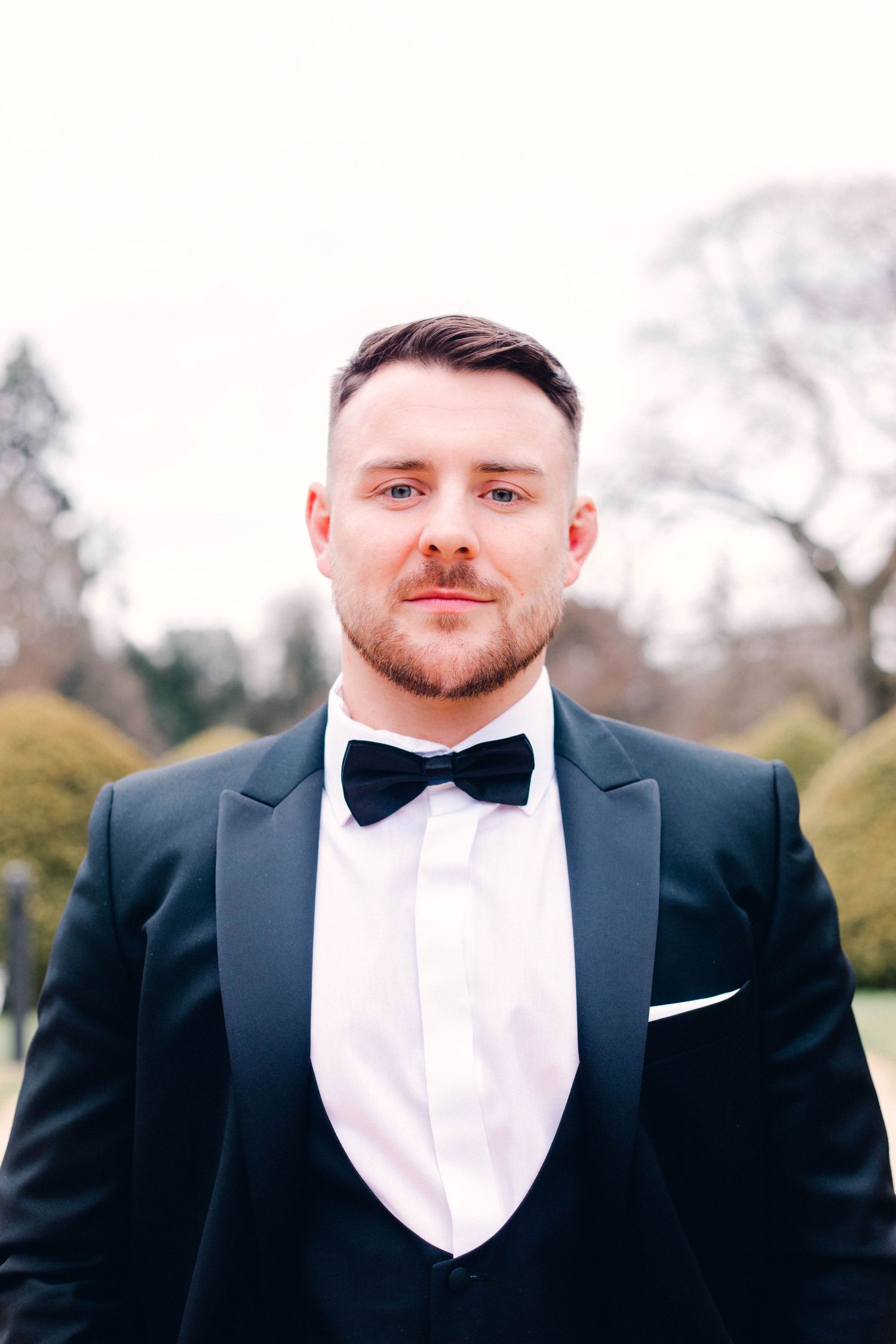 classic and sophisticated groom portrait black tie and elegant