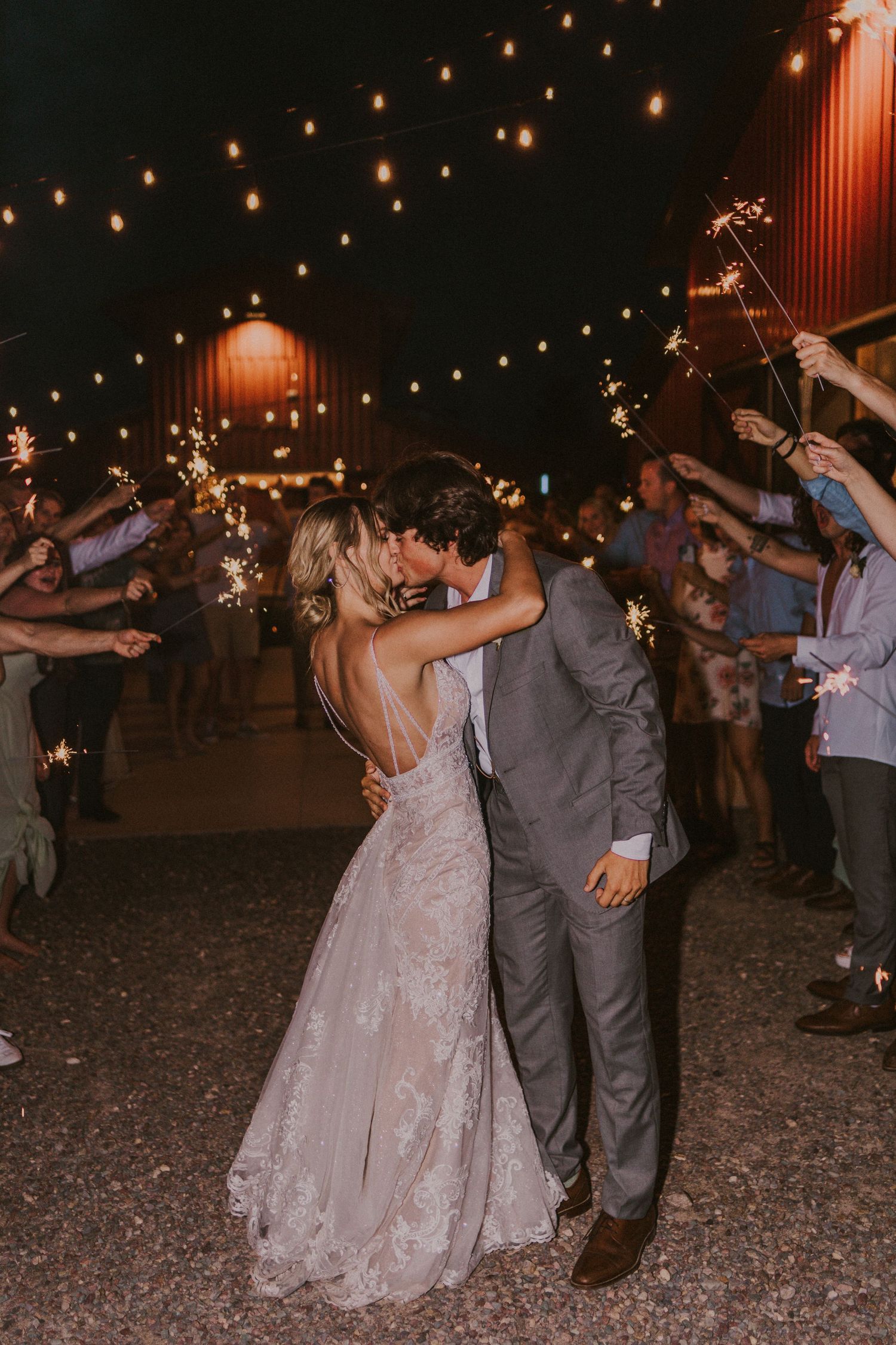 a bride and groom during their sparkler send off